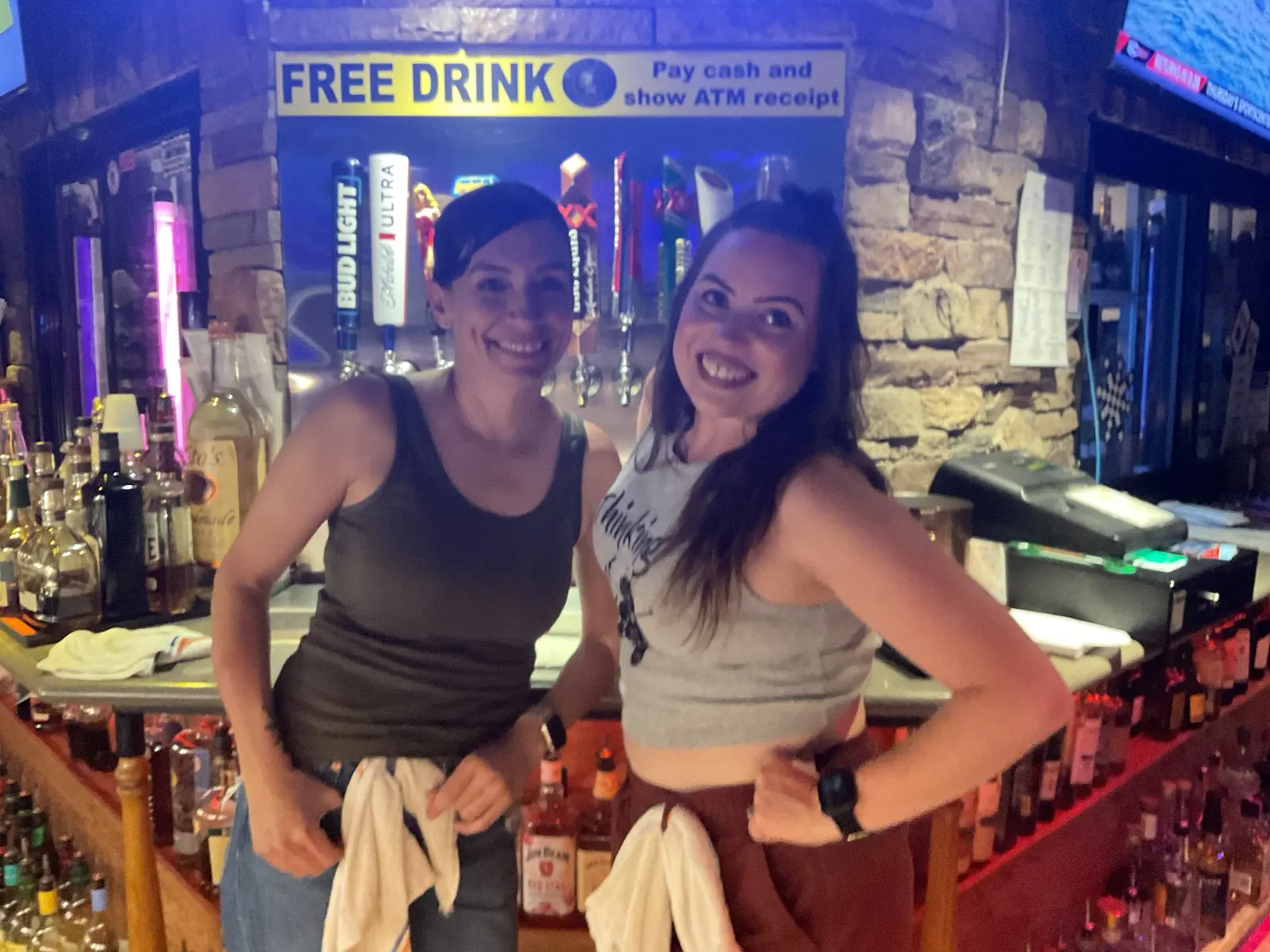 Friends smiling together during karaoke night